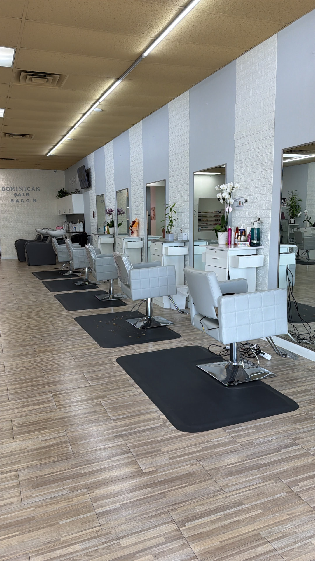 Interior of Dominican Hair Salon with styling chairs and mirrors